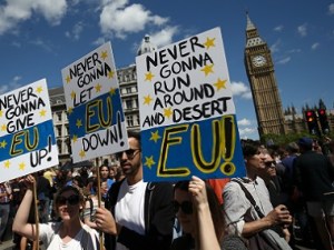 People hold banners during a demonstration against Britain's decision to leave the European Union, in central London