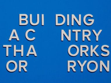 The wording on a slogan is changed after letters fell away from the backdrop immediately after Britain's Prime Minister Theresa May concluded her address to the Conservative Party conference in Manchester